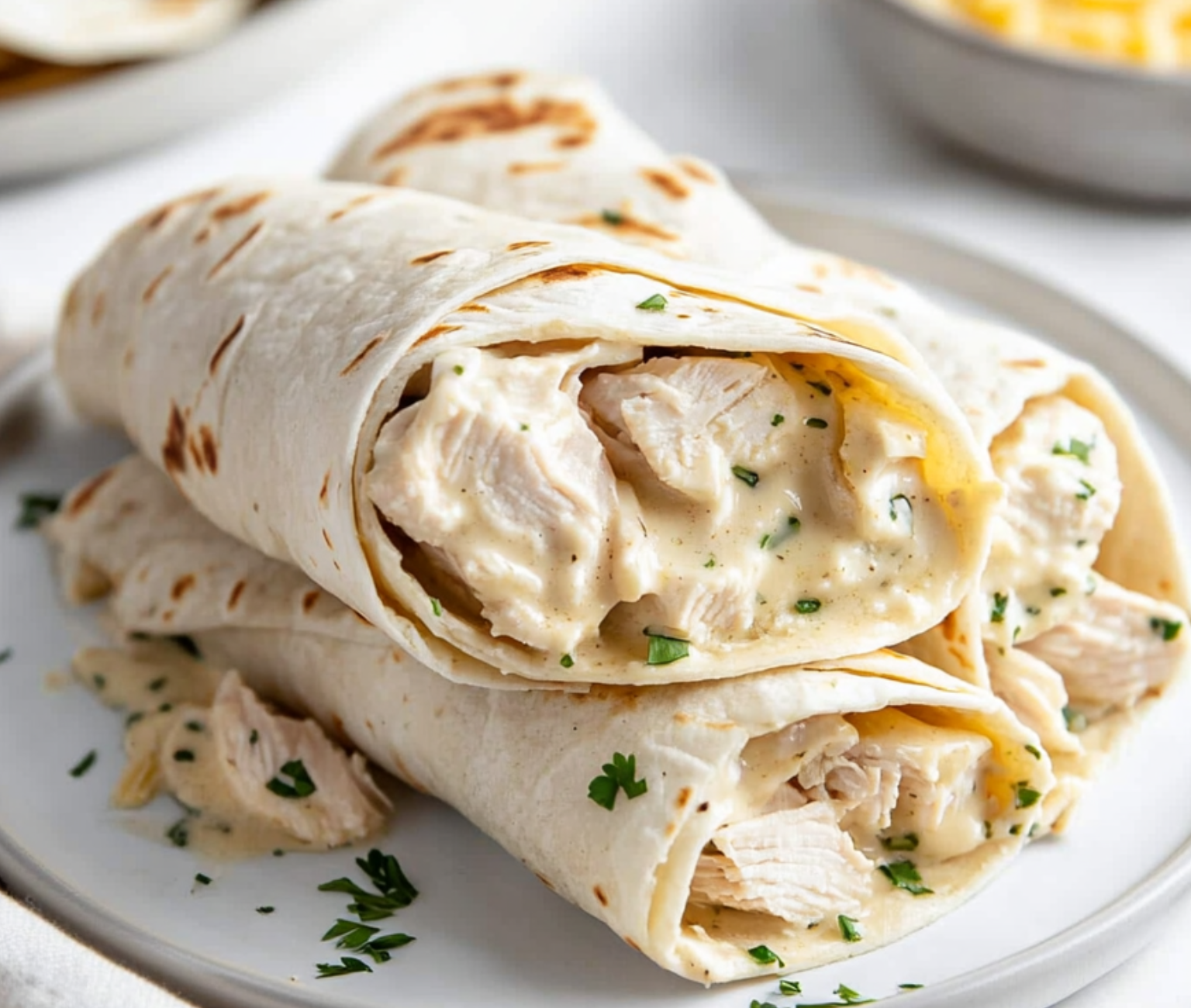 Creamy Chicken Alfredo Wraps on a Plate