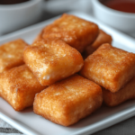 Crispy Cinnamon Cheesecake Bites Ready to Serve