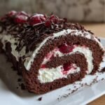 Elegant Black Forest Cake Roll: Chocolate, Cream, & Cherry Swiss Roll Dessert! Perfect for Holiday